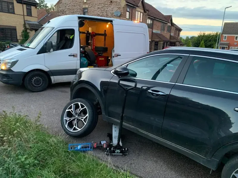 Hassle-free at-home mobile tyre fitting service on a residential driveway across Bedfordshire, Bucks, and Herts.